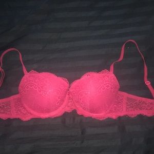 Bright pink lace bra